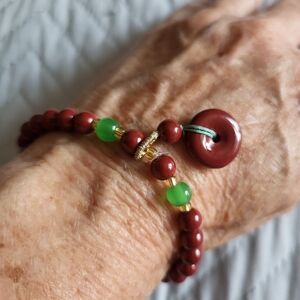 Elegant Red and Green Beaded Bracelet